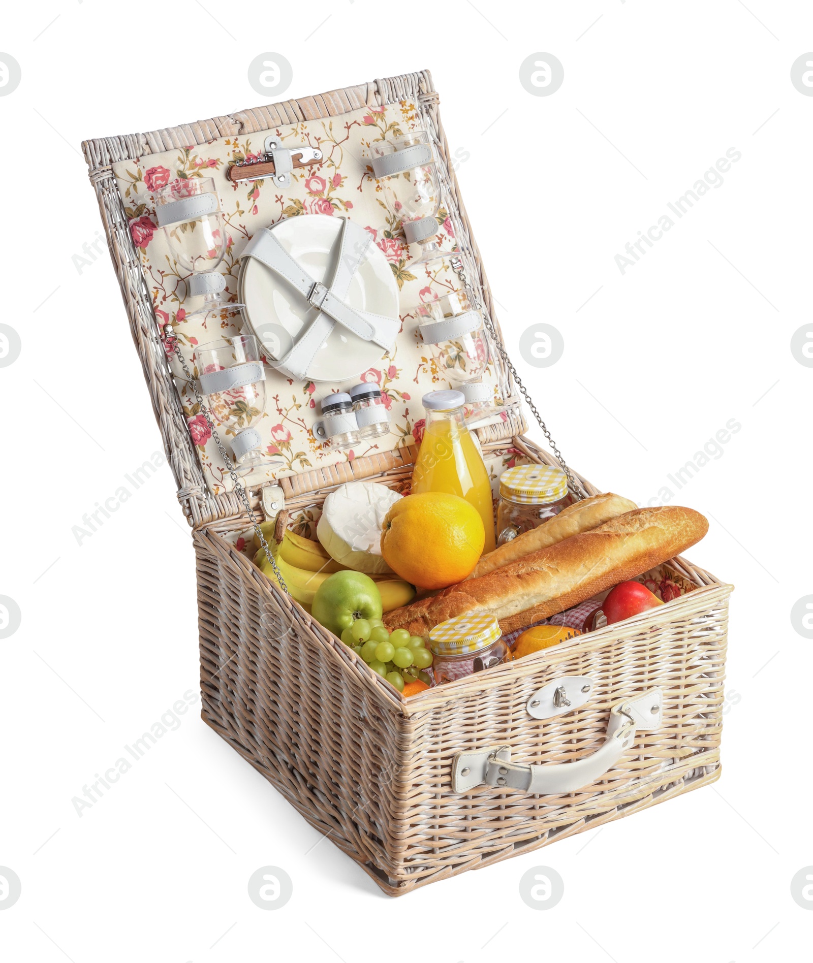 Photo of Picnic basket with tableware, food and drink isolated on white