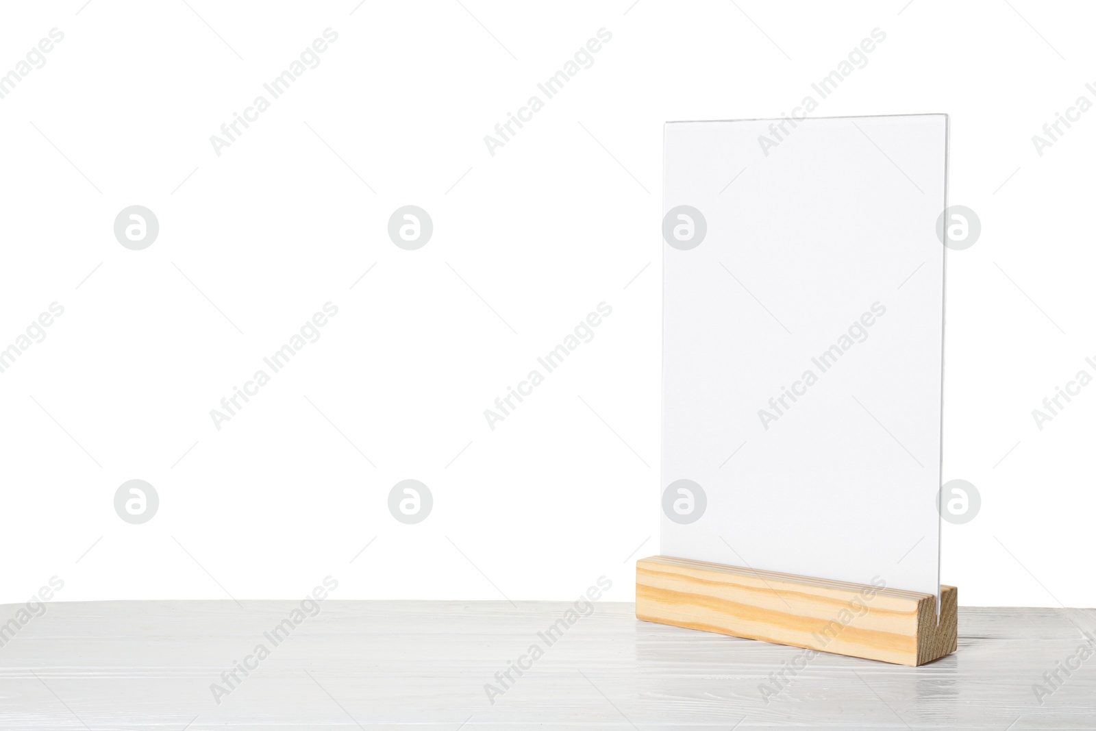 Photo of Menu holder on wooden table against white background. Space for text