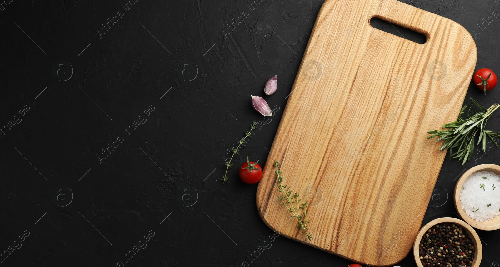 Photo of Cutting board, fresh tomatoes and different spices on grey textured table, flat lay. Space for text