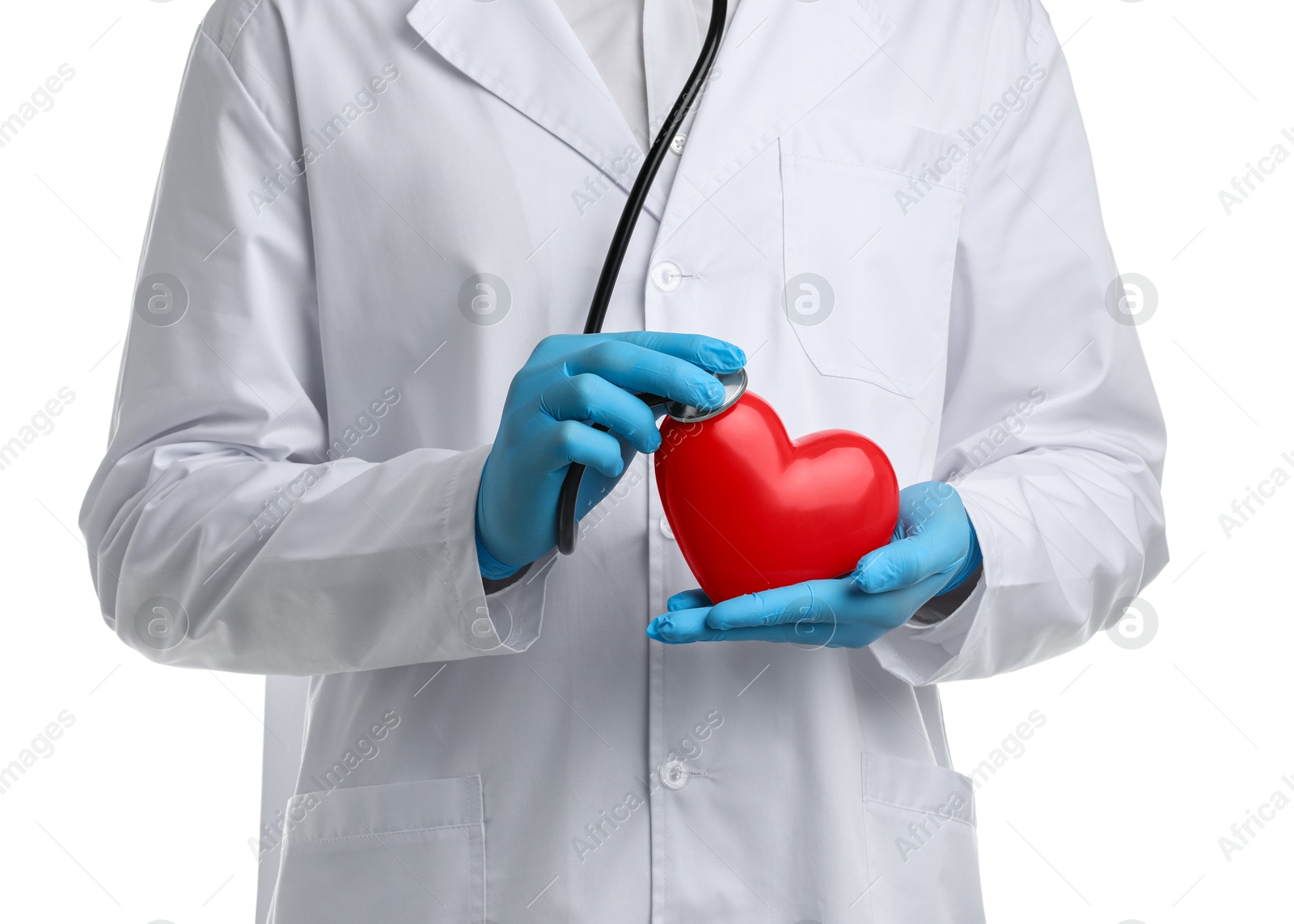 Photo of Doctor with stethoscope and red heart isolated on white, closeup