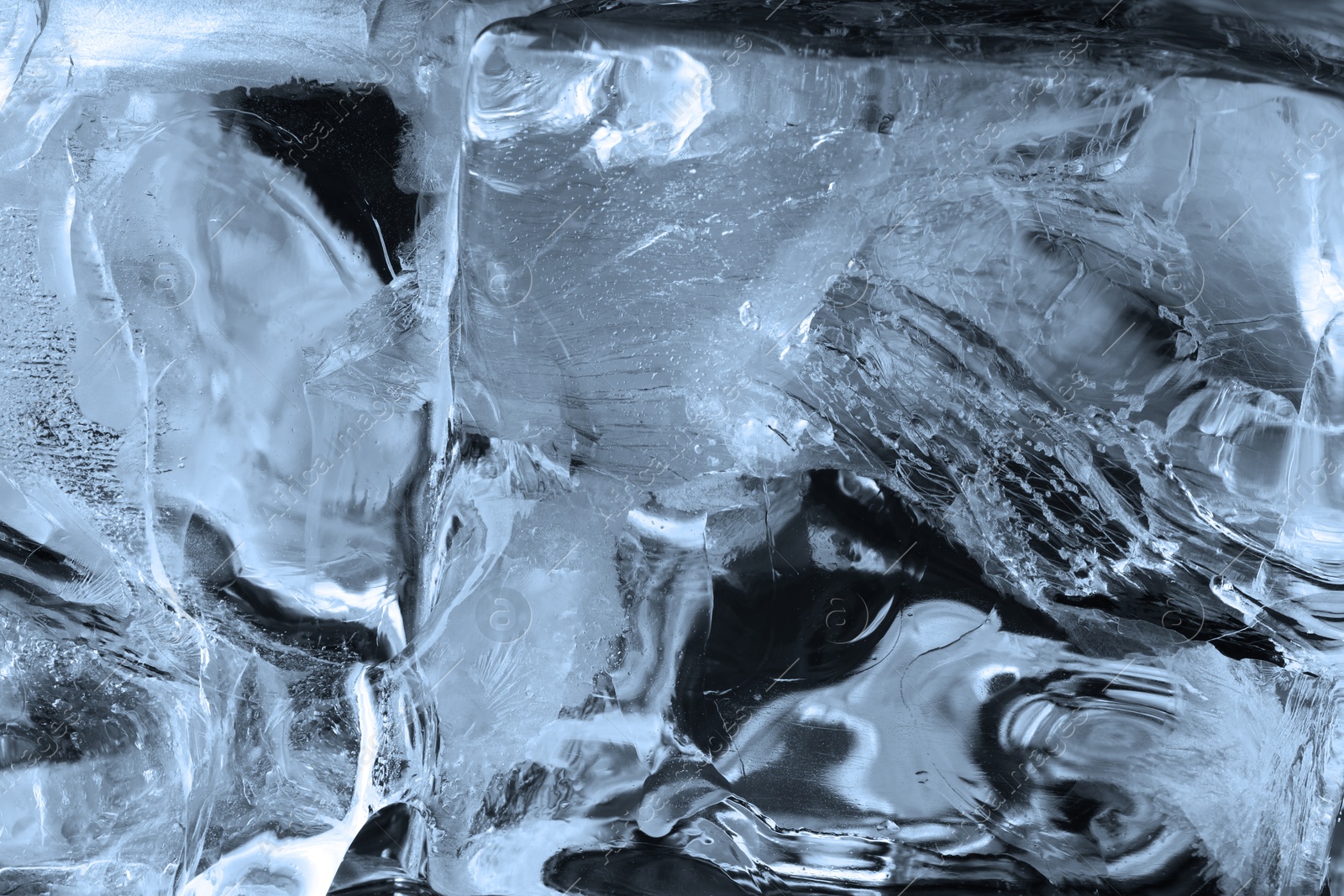 Photo of Beautiful clear ice as background, closeup view