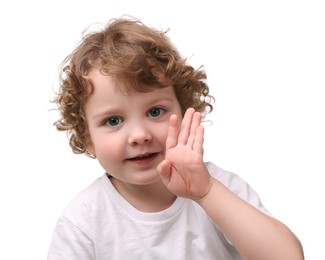 Photo of Portrait of cute little boy on white background