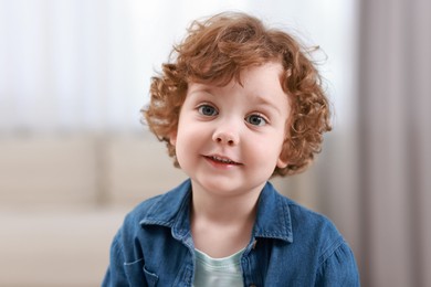 Photo of Portrait of little boy indoors. Cute child