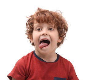 Photo of Portrait of emotional little boy showing tongue on white background