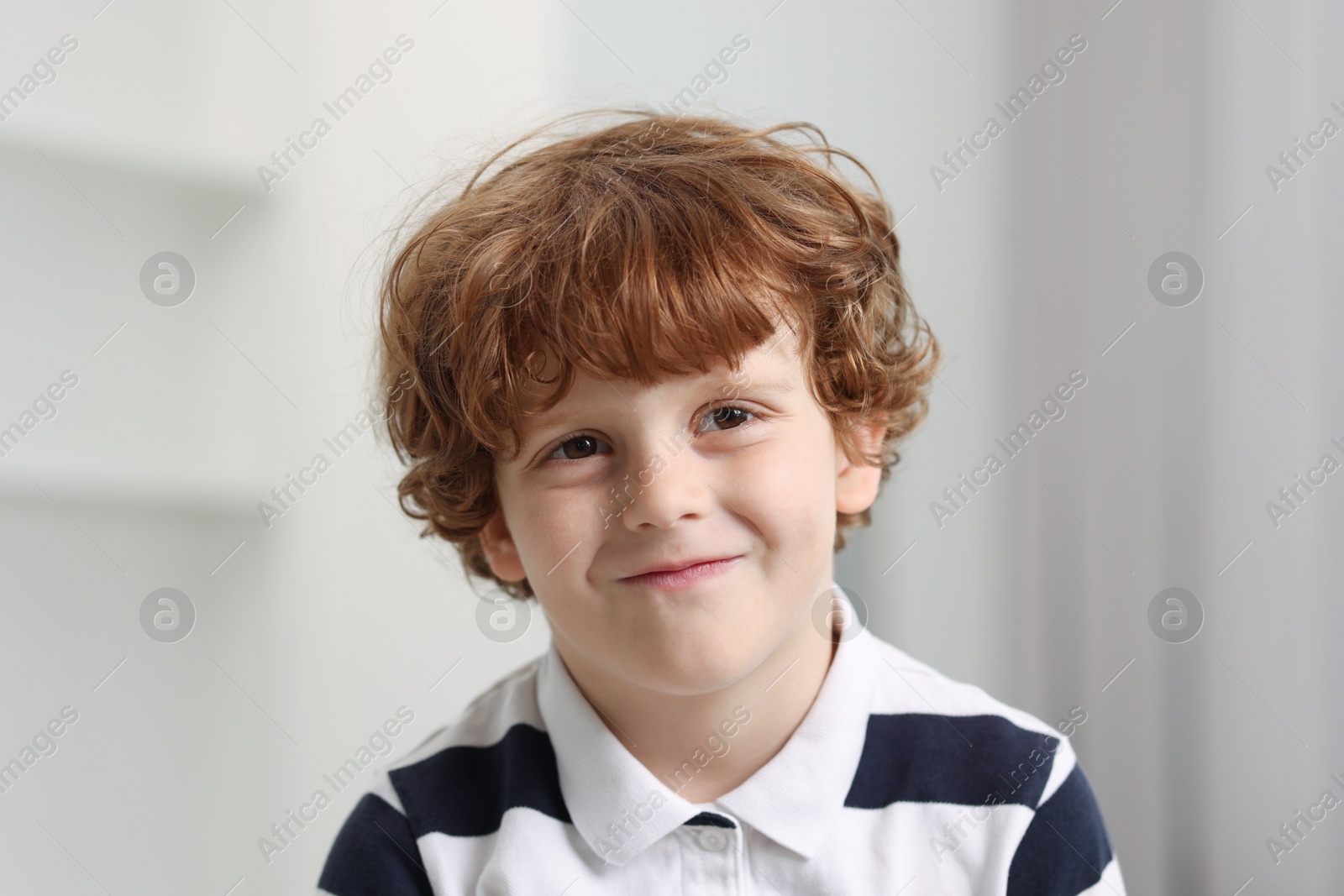 Photo of Portrait of little boy indoors. Cute child