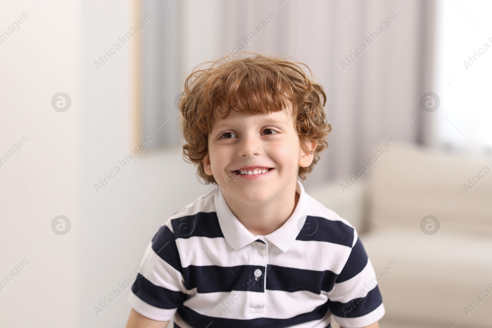 Photo of Portrait of little boy indoors. Cute child