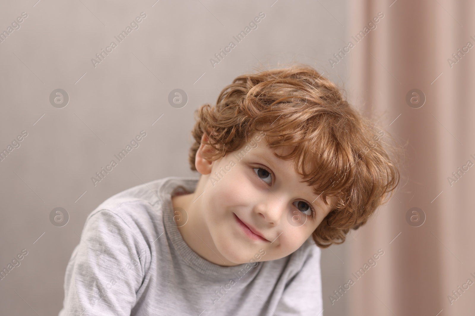 Photo of Portrait of little boy indoors. Cute child