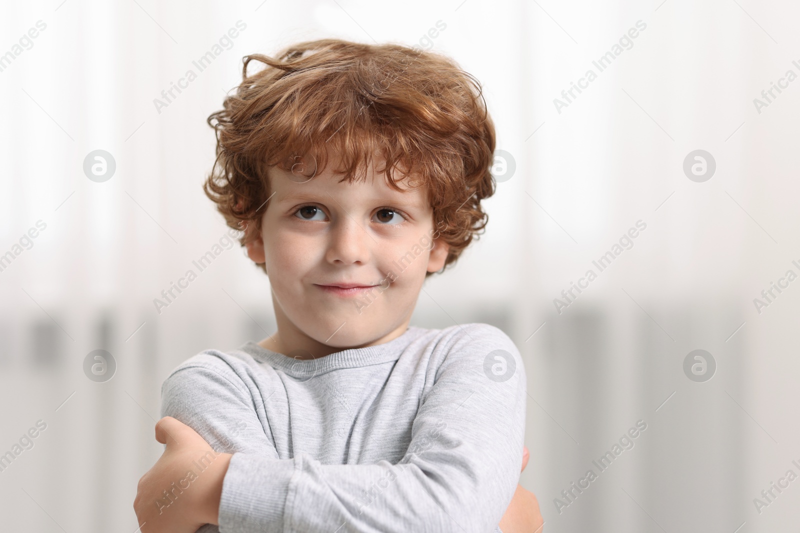 Photo of Portrait of little boy indoors, space for text. Cute child