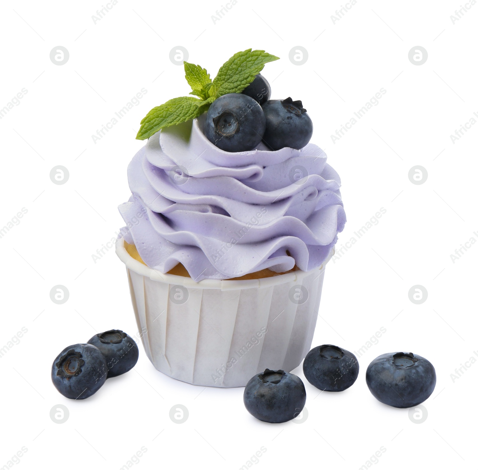 Photo of Tasty cupcake with blueberries and mint isolated on white