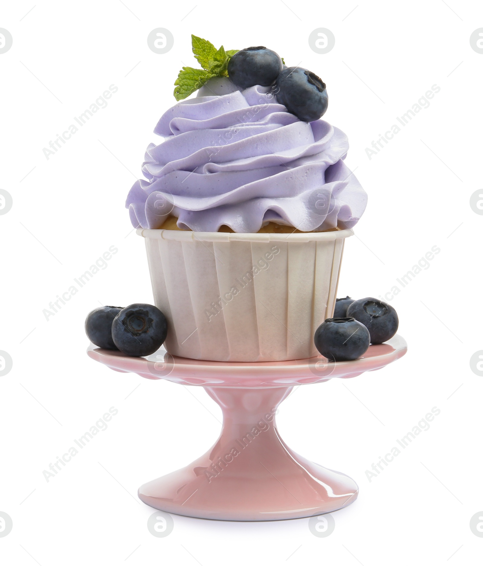 Photo of Tasty cupcake with blueberries and mint isolated on white