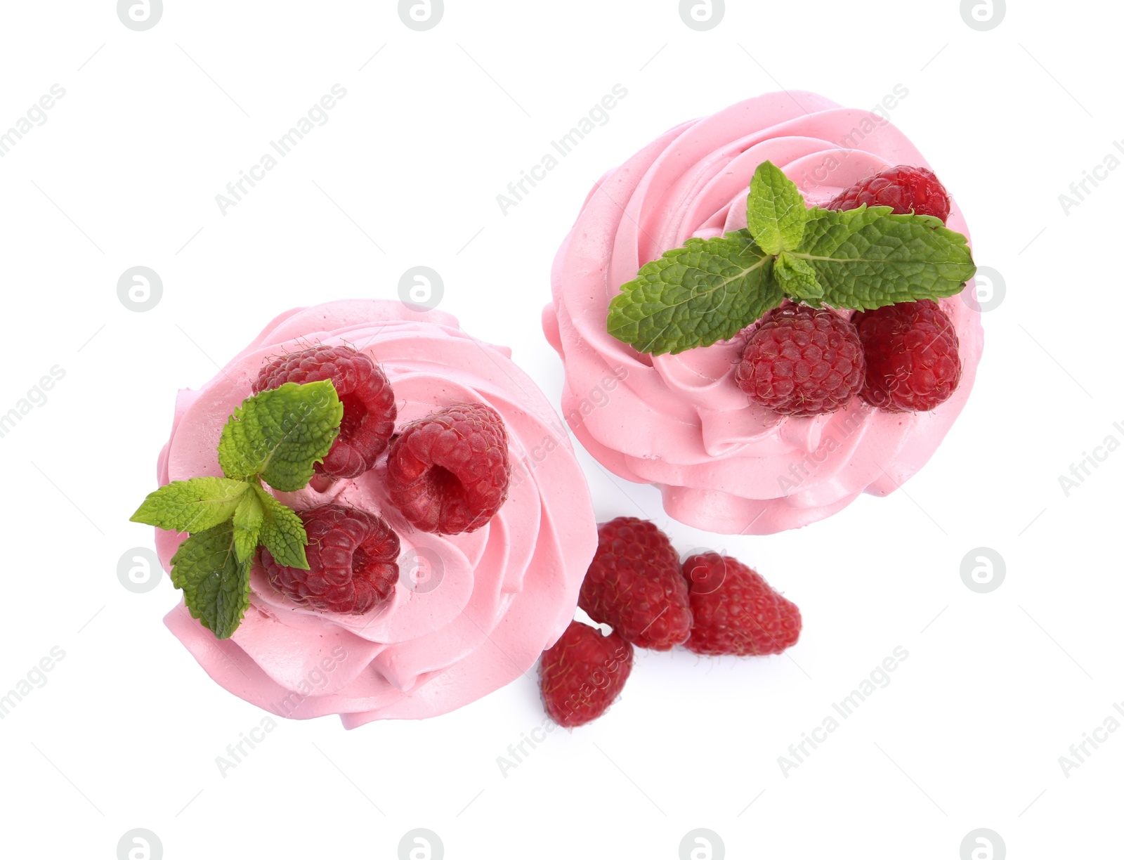 Photo of Tasty cupcakes with raspberries and mint isolated on white, top view