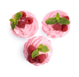 Photo of Tasty cupcakes with raspberries and mint isolated on white, top view