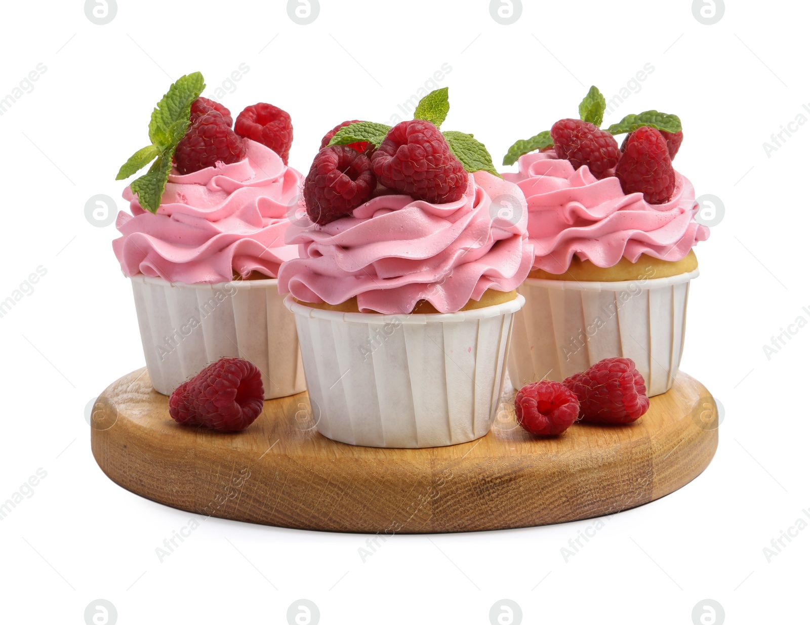 Photo of Tasty cupcakes with raspberries and mint isolated on white