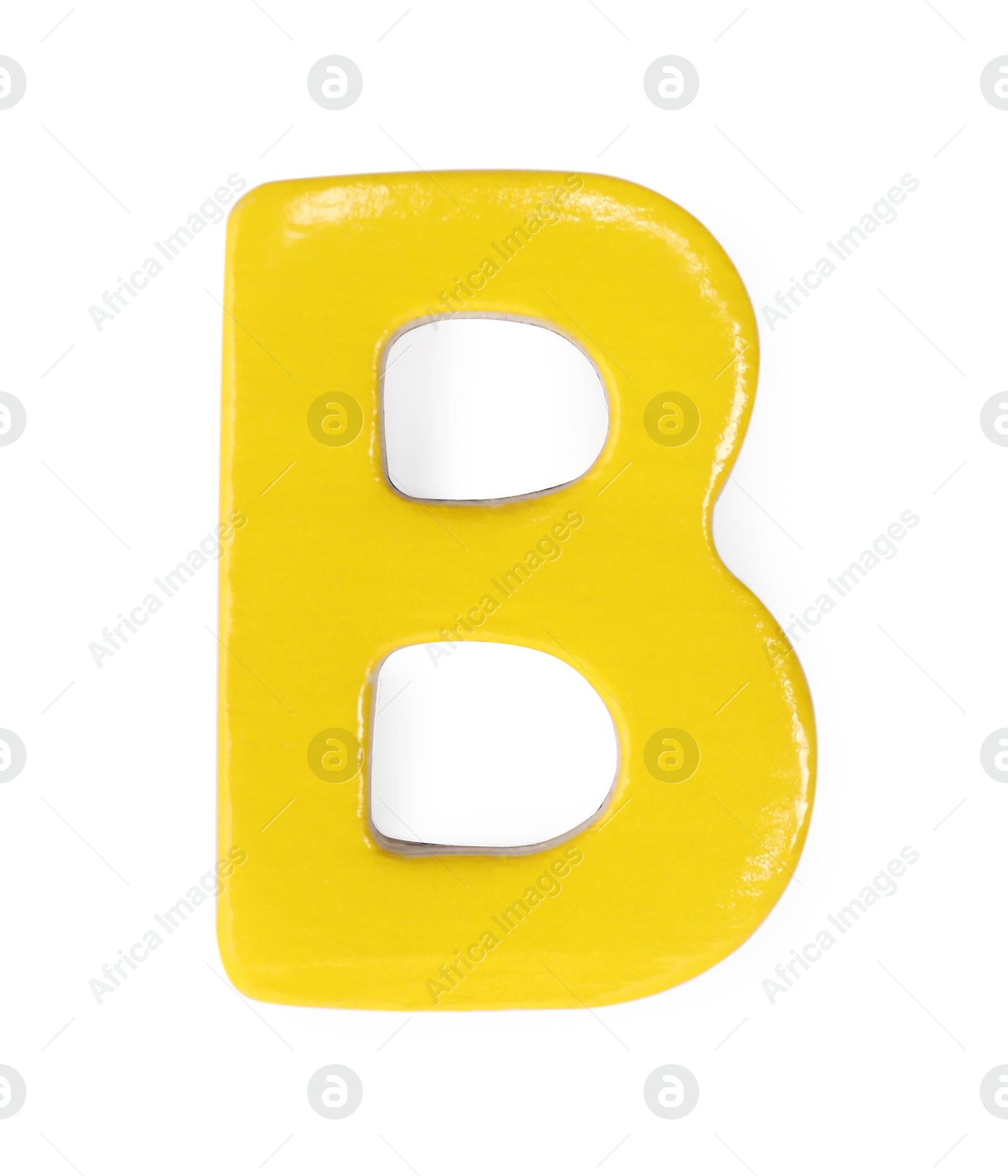 Photo of Yellow magnetic letter B isolated on white, top view. Alphabet