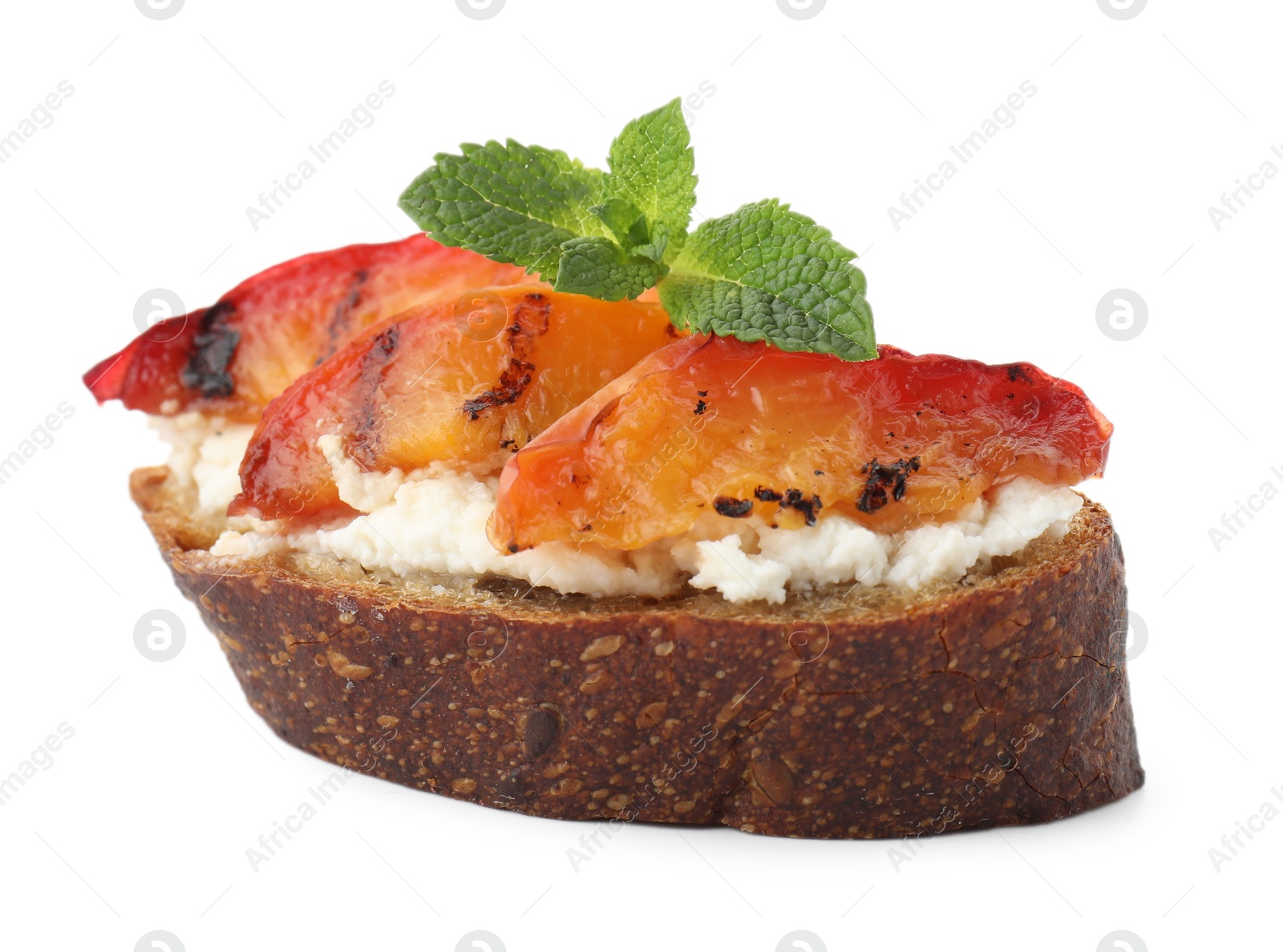 Photo of Delicious bruschetta with ricotta cheese, peach and mint isolated on white