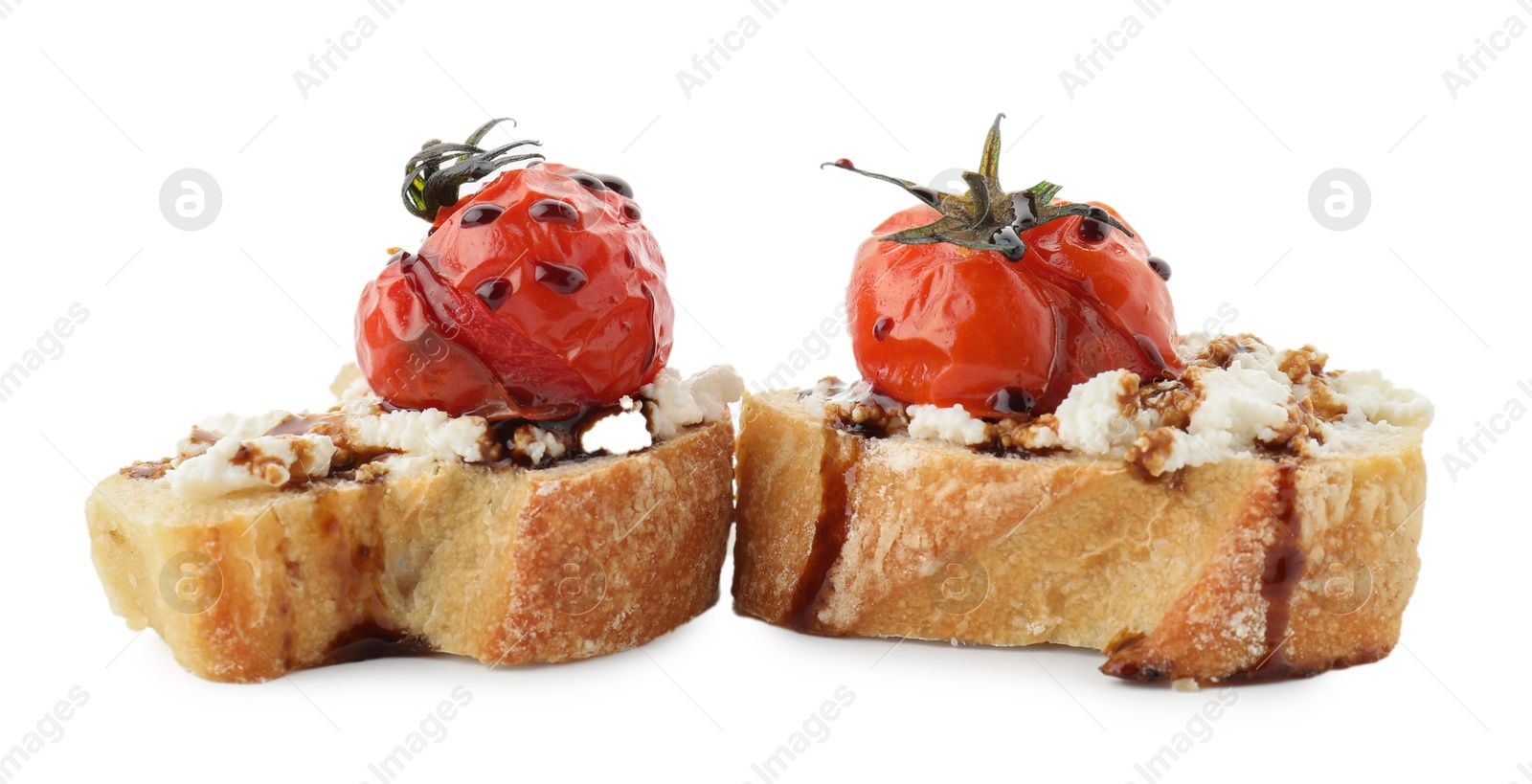 Photo of Delicious bruschettas with ricotta cheese, tomatoes and balsamic sauce isolated on white