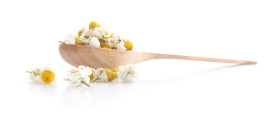 Photo of Chamomile flowers in wooden spoon isolated on white