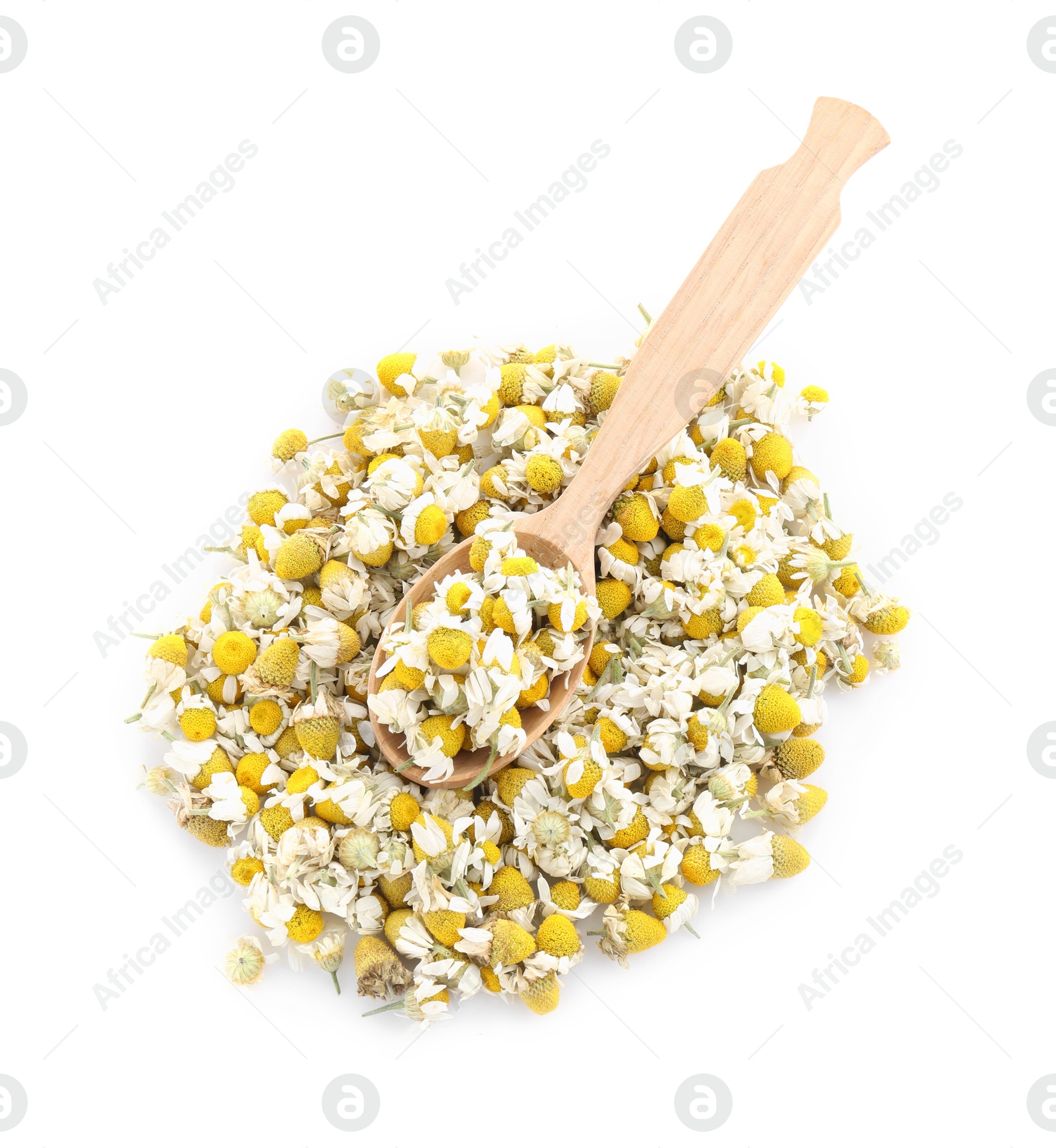 Photo of Pile of chamomile flowers and wooden spoon isolated on white, top view