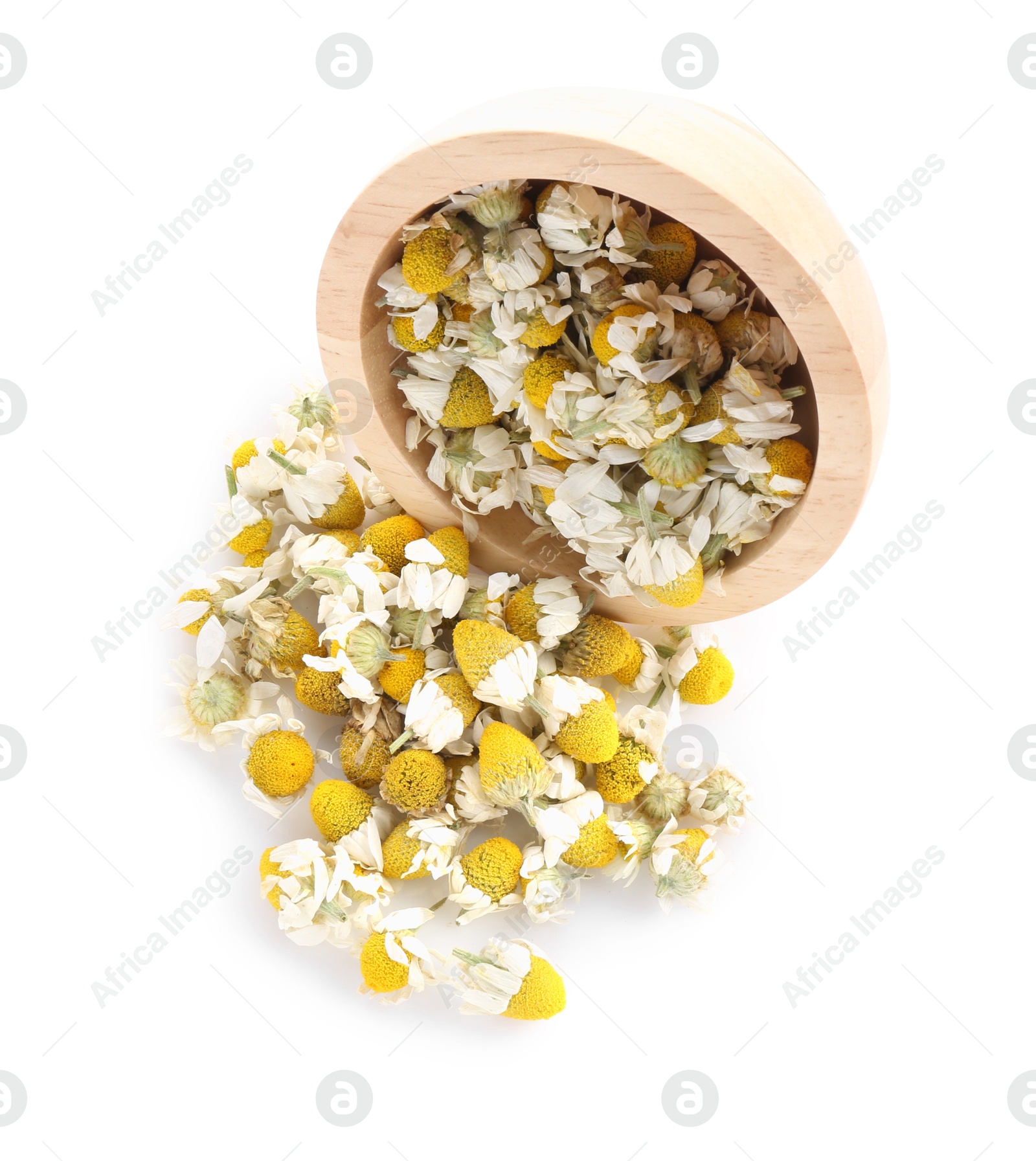 Photo of Chamomile flowers and wooden bowl isolated on white, top view