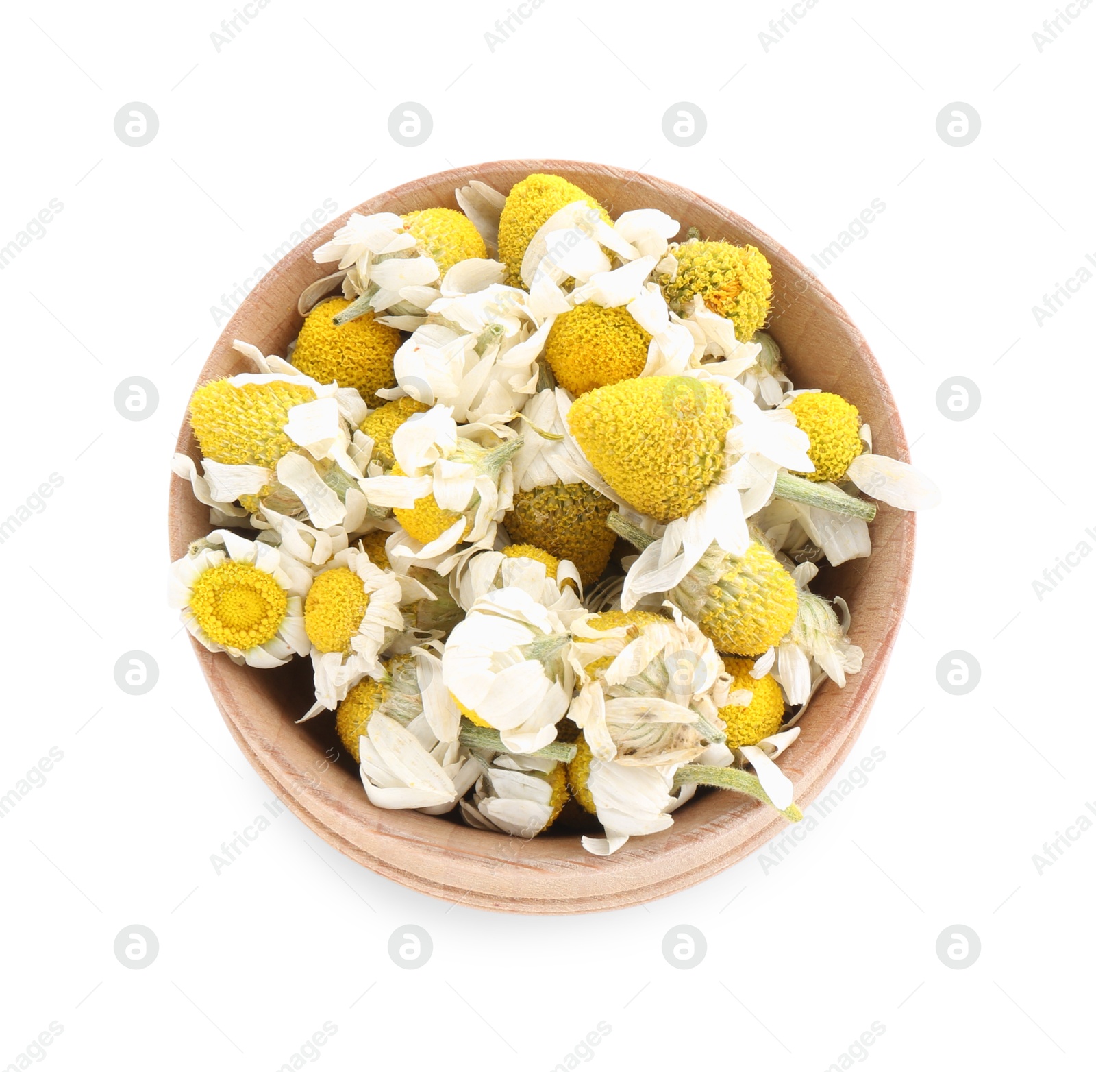 Photo of Chamomile flowers in wooden bowl isolated on white, top view