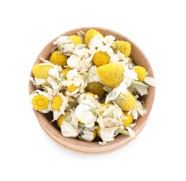 Chamomile flowers in wooden bowl isolated on white, top view