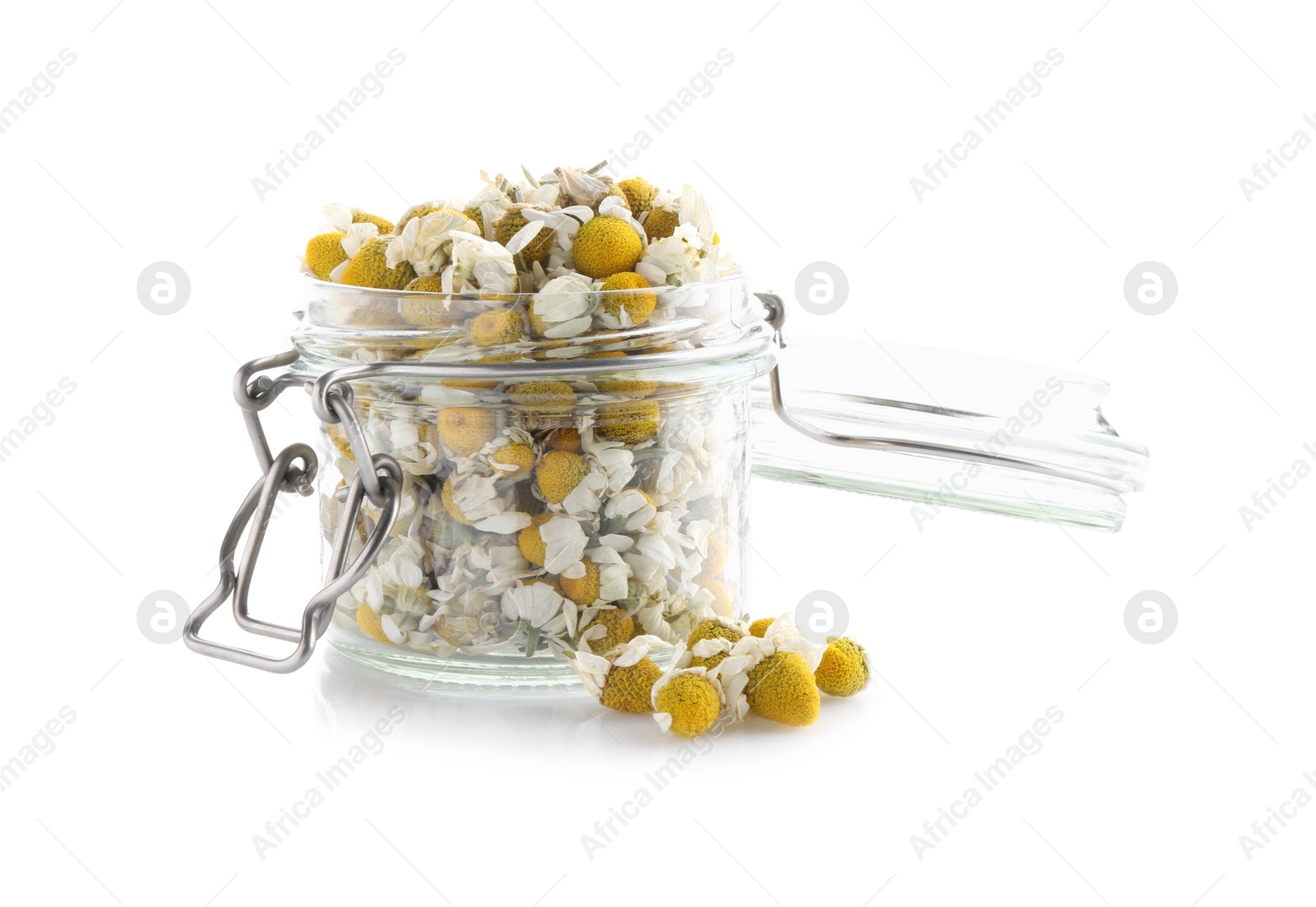 Photo of Chamomile flowers in glass jar isolated on white