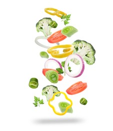 Fresh vegetables for salad in air on white background