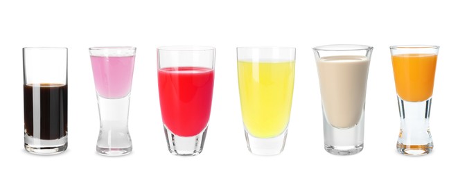 Image of Different tasty liqueurs in glasses on white background, collection