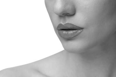 Image of Woman with beautiful lips on white background, closeup. Black and white effect