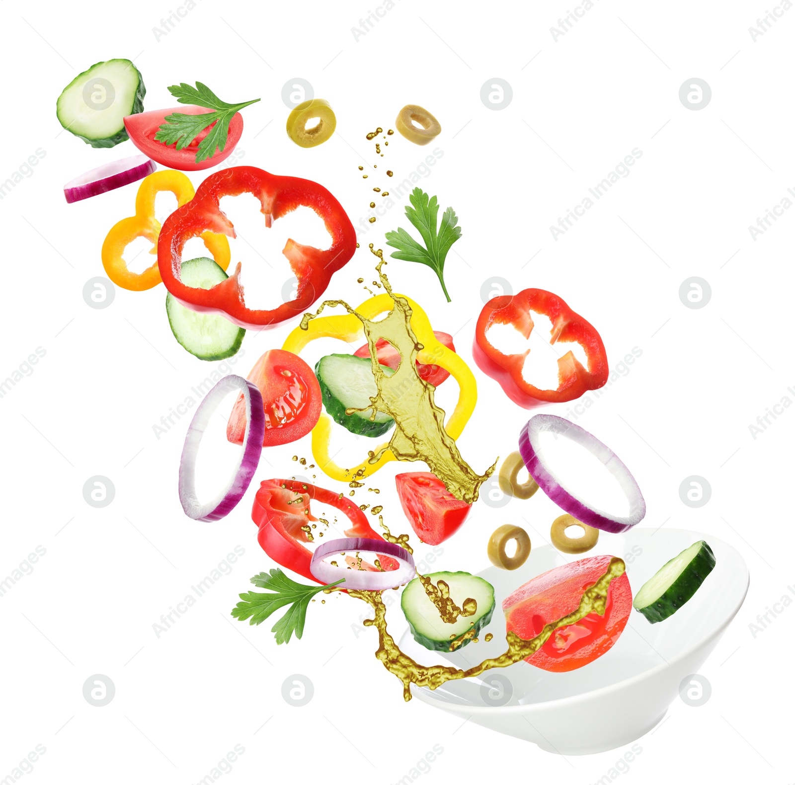 Image of Bowl with fresh vegetables and oil in air on white background. Making fresh salad