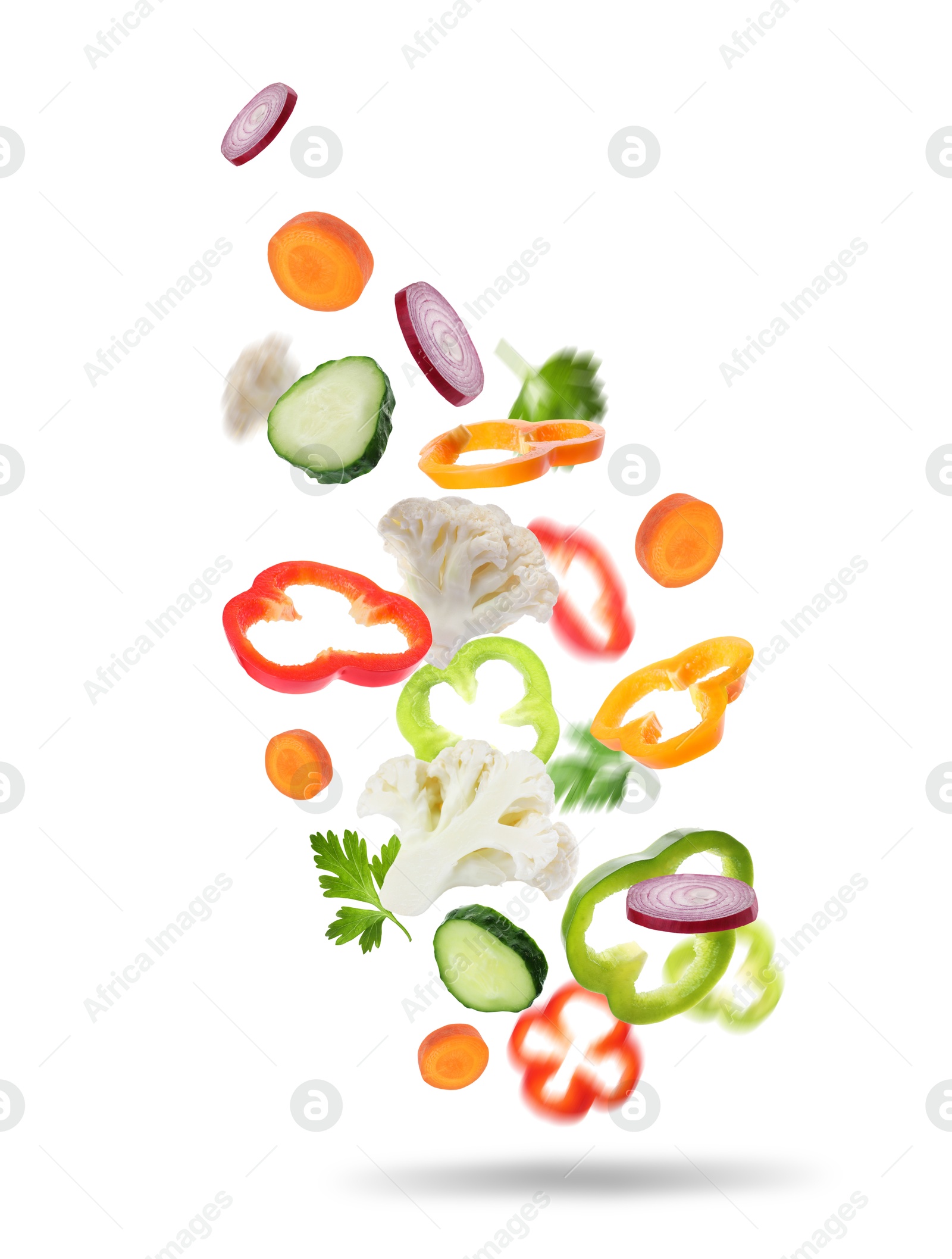 Image of Fresh vegetables for salad in air on white background