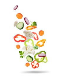 Fresh vegetables for salad in air on white background