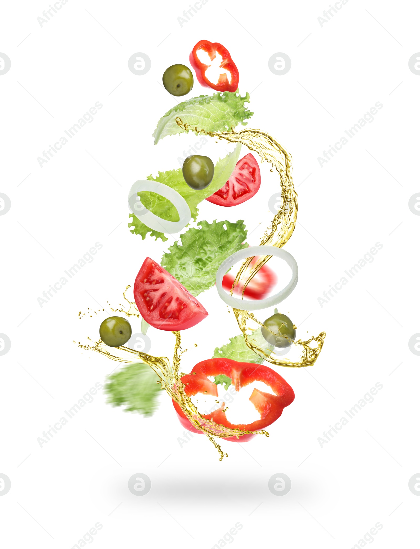 Image of Fresh vegetables and oil for salad in air on white background