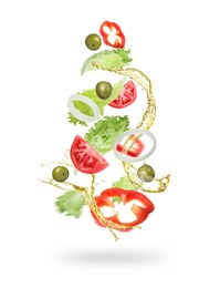 Fresh vegetables and oil for salad in air on white background