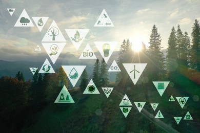 Image of Environmental protection. Many different icons and mountain landscape