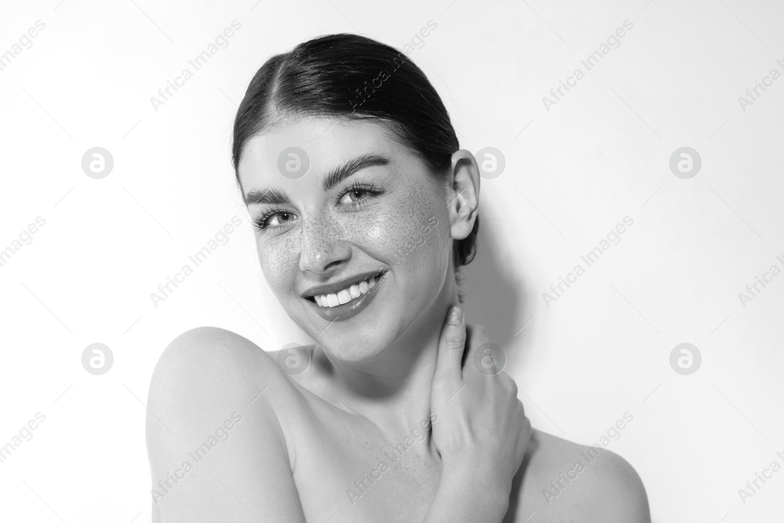 Image of Black and white portrait of beautiful woman on white background