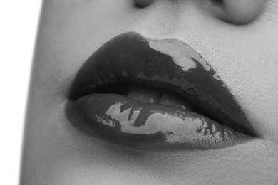 Woman with beautiful lips, closeup. Black and white effect