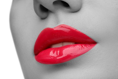 Image of Woman with beautiful red lips, closeup. Black and white effect with color accent