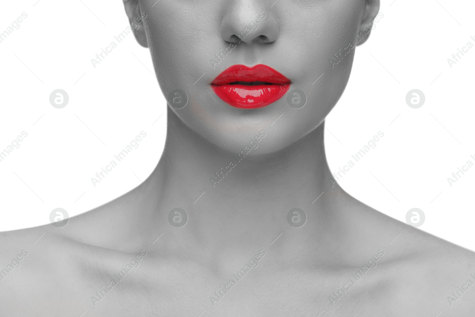 Image of Woman with beautiful red lips on white background, closeup. Black and white effect with color accent