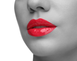 Image of Woman with beautiful red lips, closeup. Black and white effect with color accent