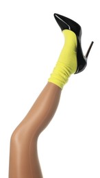 Woman wearing yellow sock and high heel shoe on white background, closeup