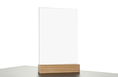 Photo of Menu holder on grey table against white background. Mockup for design