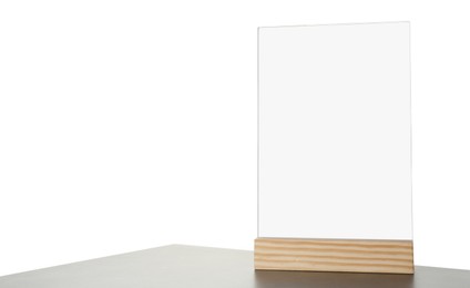 Menu holder on grey table against white background. Space for text