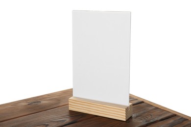 Photo of Menu holder on wooden table against white background. Mockup for design