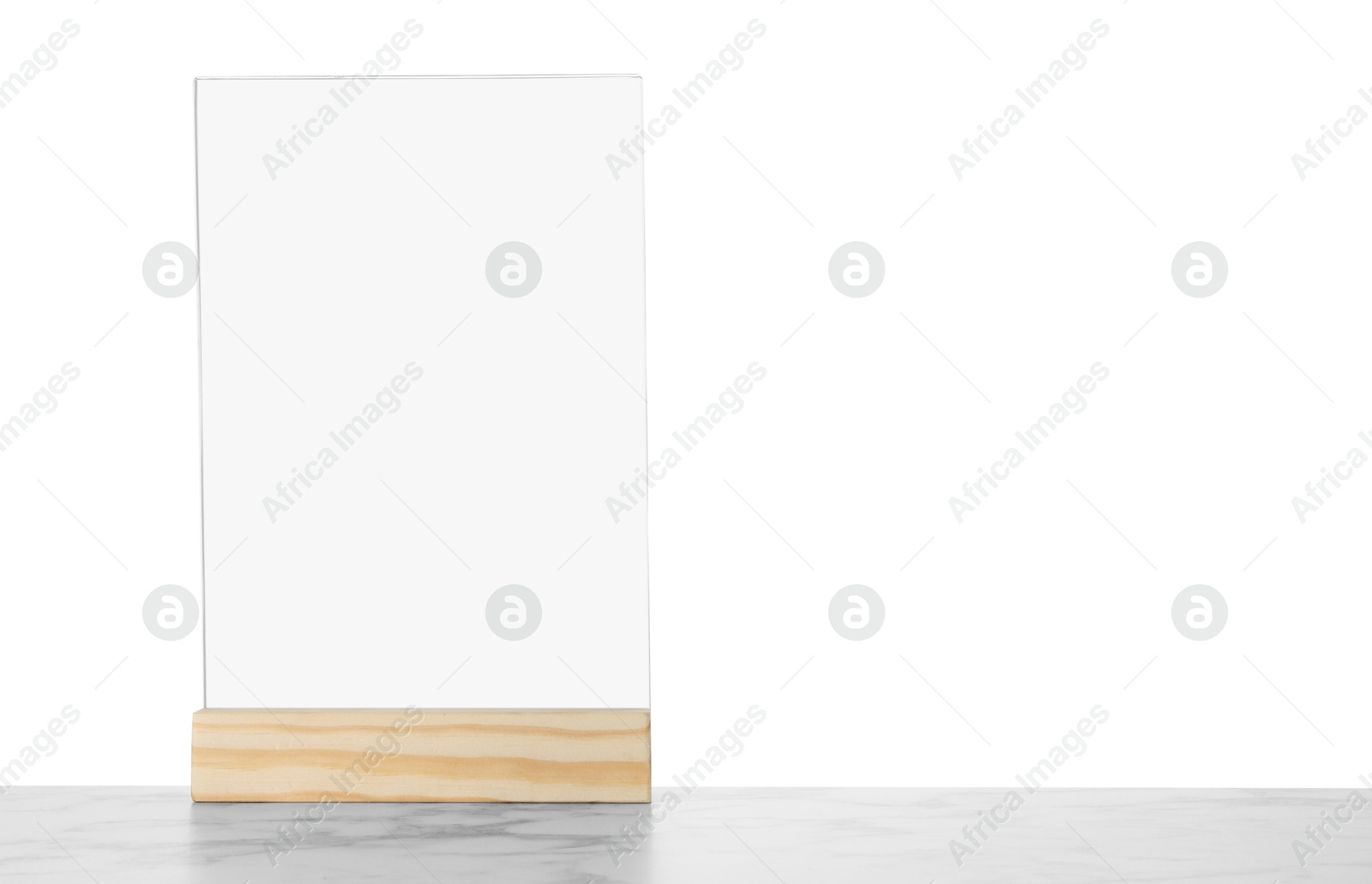 Photo of Menu holder on marble table against white background. Space for text