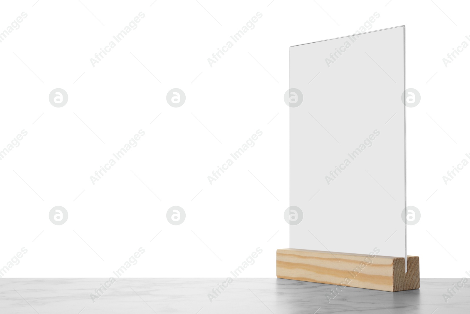 Photo of Menu holder on marble table against white background. Space for text