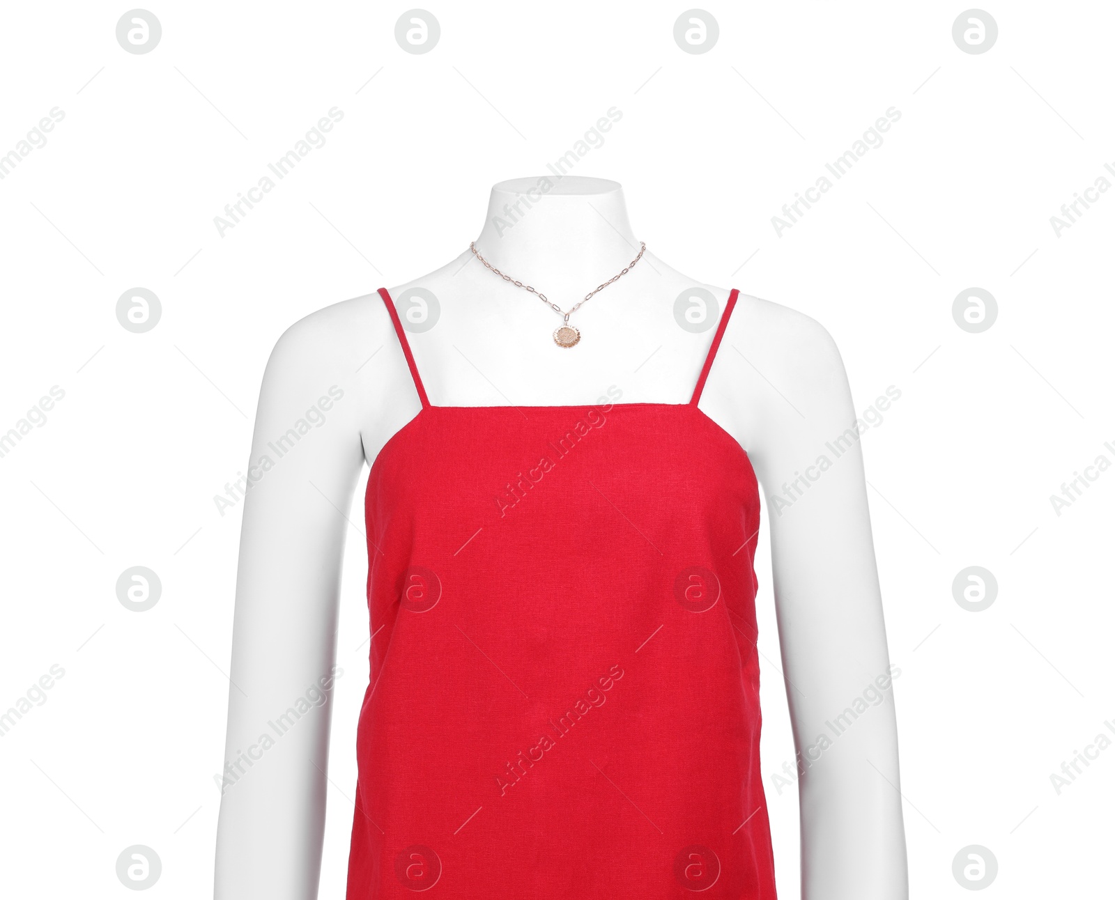 Photo of Female mannequin with necklace dressed in stylish red dress isolated on white