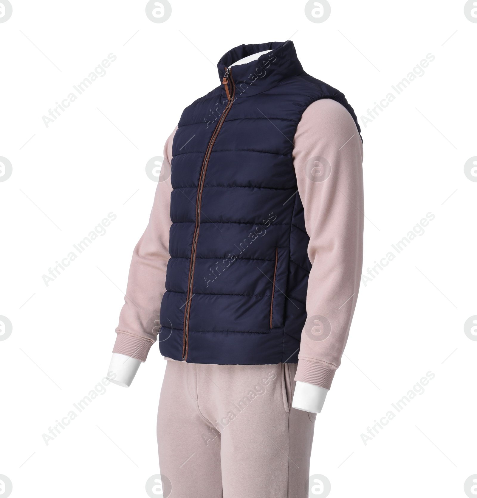 Photo of Male mannequin dressed in stylish beige tracksuit and coat isolated on white