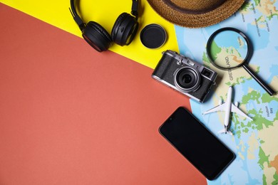 Photo of Flat lay composition with travel blogger`s items on color background