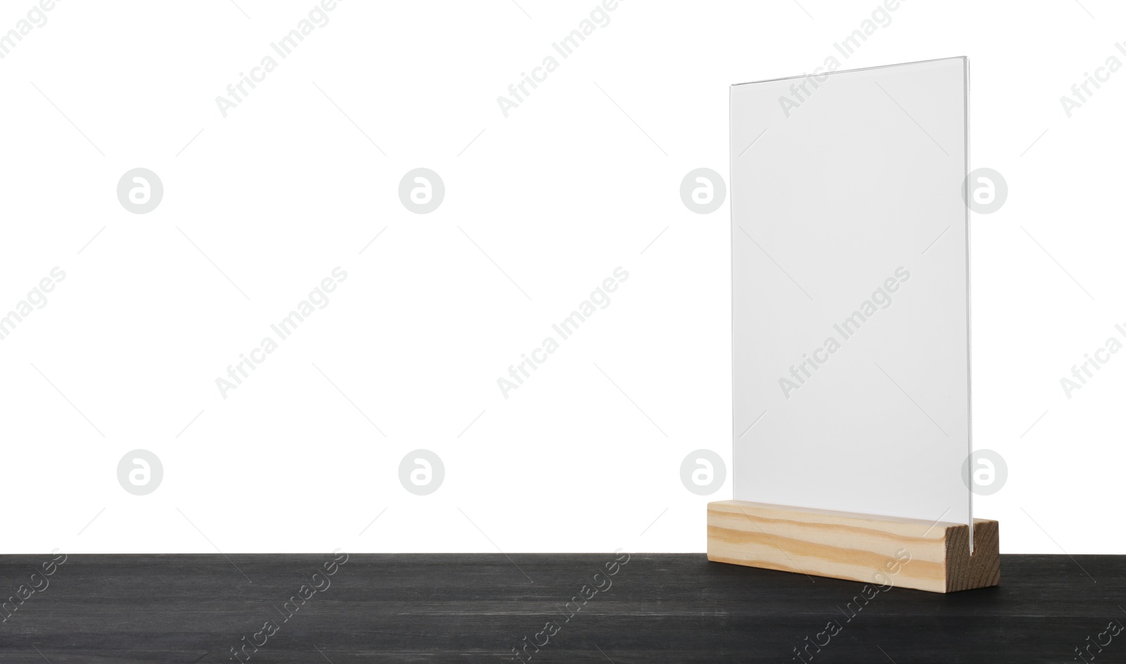 Photo of Menu holder on black wooden table against white background. Space for text